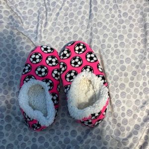 Fuzzy Pink slippers with soccer balls on top